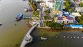 Top view aerial view love bridge or Ninh Kieu quay of downtown in Can Tho City, Vietnam with development buildings, transportation