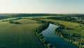 Top view, aerial photo from drone or aerostat to summer nature landscape panorama, green meadows in countryside at sunset time Royalty Free Stock Photo