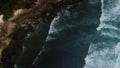 Top view aerial photo from flying drone of an amazingly beautiful sea & ocean landscape with waves.