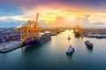 Top view, aerial view the ship container for transporting goods by sea at sea port warehouse and crane ship working for delivery