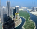 Top view Aerial shot of famous landmarks, towers and skyscrapers in Al Reem island