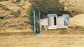 Top view of an agricultural vehicle reaping rye