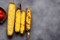 Top view of the AI-generated grilled corns on the table