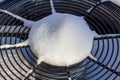 Top view of an air conditioning unit covered with snow Royalty Free Stock Photo