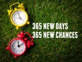 Top view alarm clock with text 365 new day and new chances Royalty Free Stock Photo