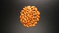 TOP VIEW: Almonds on a black table