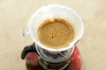 Top view of alternative method of brewing v60 coffee in a glass drip decanter. Royalty Free Stock Photo