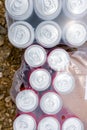 Top view aluminum, metal unopened cans in two open packs, package with plastic foil over Royalty Free Stock Photo