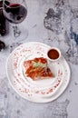 Top view of American food barbecue ribs steak with pepper sauce ketchup in ceramic dish on white plate and glass of red Royalty Free Stock Photo