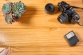 Top view of analog camera, flash and lens on wooden table, professional photography equipment. Photography background with copy sp Royalty Free Stock Photo