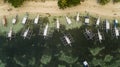 Top view of anchored boats on a beach in Panglao, late afternoon aerial Royalty Free Stock Photo