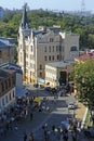 Top view of Andreevsky descent, crowd of people walking down the street. Kyiv, Ukraine