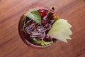Top view of Apple cocktail with cinnamon and sliced fresh apple in wine glass on wooden table Royalty Free Stock Photo