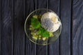 Top view of apple ice cream decorated with kiwi, mint leaves and poppy Royalty Free Stock Photo