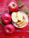 Top view of Apples on the rustic table, besides being delicious, this fruit also contains a lot of antioxidants