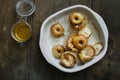 Top view apples topped nuts honey cinnamon baking wooden table Royalty Free Stock Photo