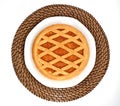 Top view of an apricot jam tart on plate and round table mat. Royalty Free Stock Photo