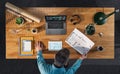 Top view of architect working on computer at desk in home office, video call concept. Royalty Free Stock Photo