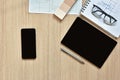 A top view of architect working desk with equipment for drawings pens sketched idea on wood table Royalty Free Stock Photo