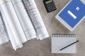 top view of architect workplace with empty textbook calculator and digital tablet with facebook