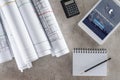 top view of architect workplace with empty textbook calculator and digital tablet with tumblr