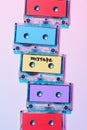 top view of arranged colorful audio cassettes with mixtape lettering