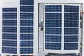 Top view of an array of polycrystalline solar panels installed on the roof of a shopping mall Royalty Free Stock Photo