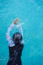 Top view Asian child little girl learn to swim