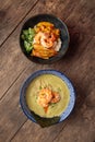 Top view matcha ramen and curry with langoustines