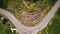 Asphalt road on the hill in Phetchabun province, Thailand. Aerial view from flying drone.