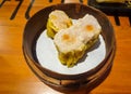 Top View of Assorted Chinese Dimsum in bamboo basket.