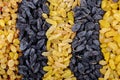 Top view of assortment of dried fruits black and yellow raisins Royalty Free Stock Photo