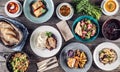 Top view of assortment of food served on a rustic wooden table