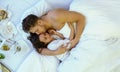 Top View of an attractive, contented, young loving couple after Breakfast in bed , copy space Royalty Free Stock Photo