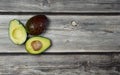 Top view Avocado cut on wooden table