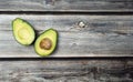 Top view Avocado cut on wooden table