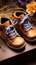 Top view of baby boots resting on an open notebook, a charming composition