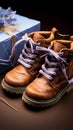 Top view of baby boots resting on an open notebook, a charming composition