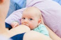 Top view of baby breastfed on pillow