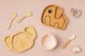 Top view of baby tableware. First safe plate for baby and toddler Royalty Free Stock Photo