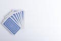 Top vieÃâ  of deck of plaing cards on the white surface.Empty space for text Royalty Free Stock Photo