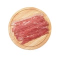 Top view of bacon strips on wooden cutting board Royalty Free Stock Photo