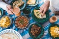 top view of Bahraini dining table in Ramadan with Ramadan decoration, that contains Karak, samosa, Loba, Lgemat, Balalet Royalty Free Stock Photo