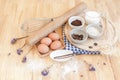 Top View Baking Preparation on wooden Table,Baking ingredients. Bowl, eggs and flour, rolling pin and eggshells on wooden board,