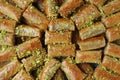 Top View of Baklava Pastries Topped with Chopped Pistachio Nuts Royalty Free Stock Photo