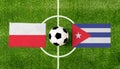 Top view ball with Poland vs. Cuba flags match on green football field