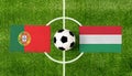 Top view ball with Portugal vs. Hungary flags match on green football field Royalty Free Stock Photo