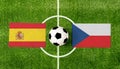 Top view ball with Spain vs. Czech republic flags match on green soccer field