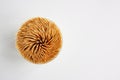 Top view of bamboo toothpicks in a plastic storage box on white background, copy space. Royalty Free Stock Photo