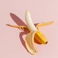 top view banana pink background